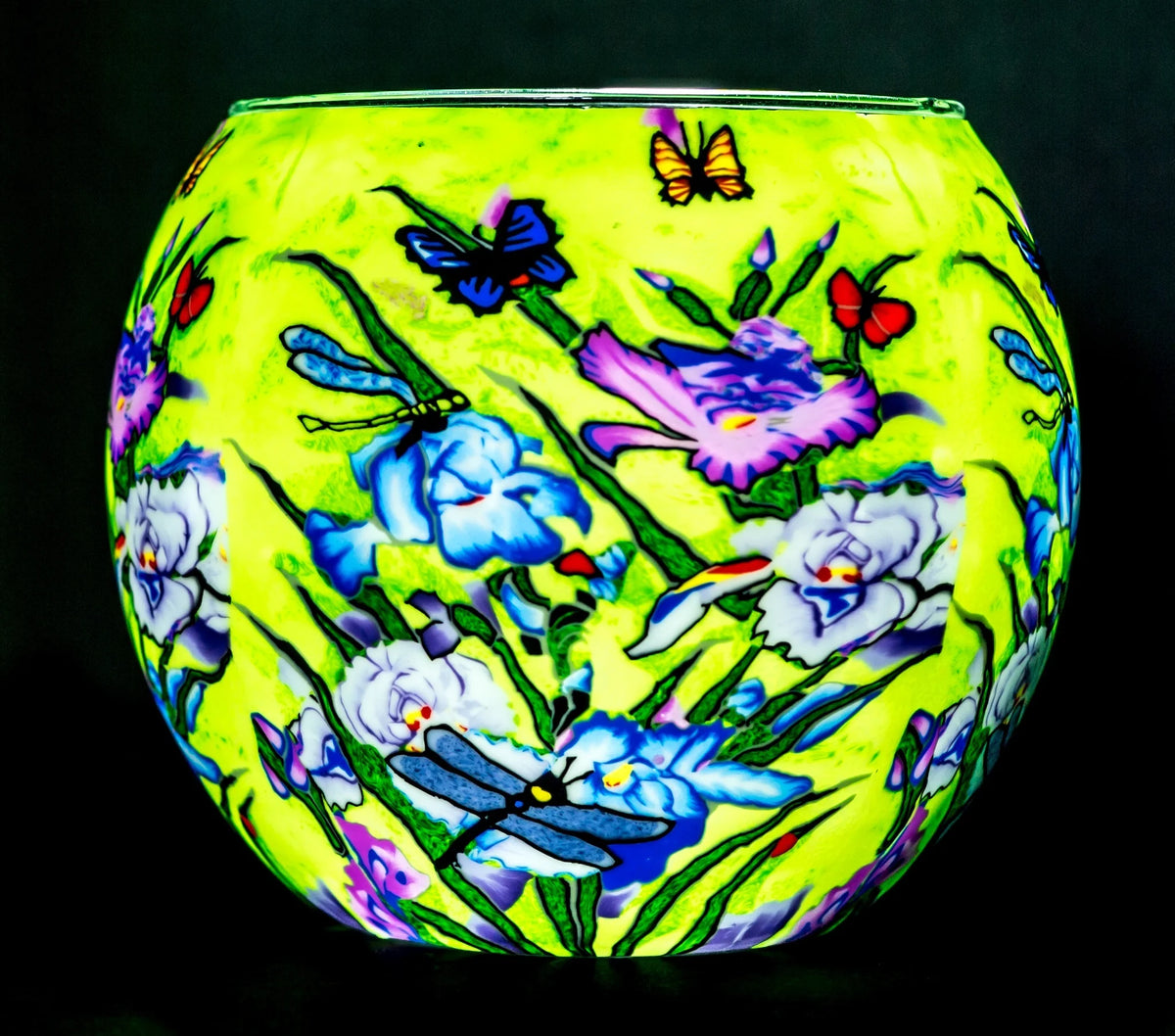 Nature's Garden Claymaster light globe glowing chartreuse with irises, butterflies and teal dragonflies across the surface