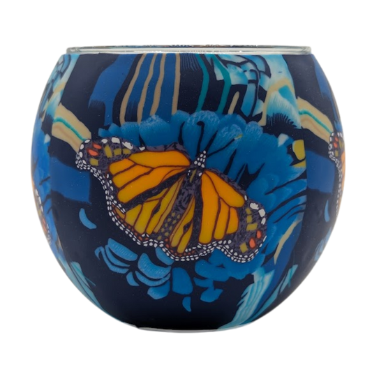Monarch Butterfly Claymaster light globe with hand-wrapped orange-and-black monarch on a swirling blue and cream background