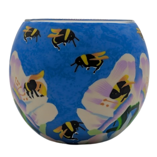 Claymaster Busy Bees light globe with bumblebees flying among white and lavender blossoms on a sky-blue background