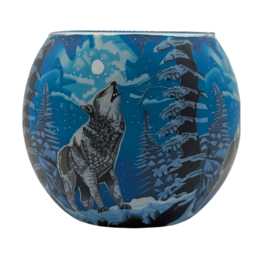 Claymaster Howling Wolf light globe with a grey wolf howling at a full moon among snowy evergreens in deep blue tones