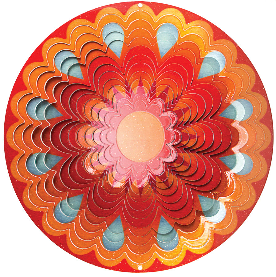 Large sunset mandala wind spinner with layered scalloped petals in red, orange and coral, blue teardrop accents and a soft peach centre
